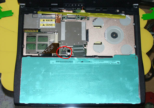 The red circle marks the location of the DIP switches.
