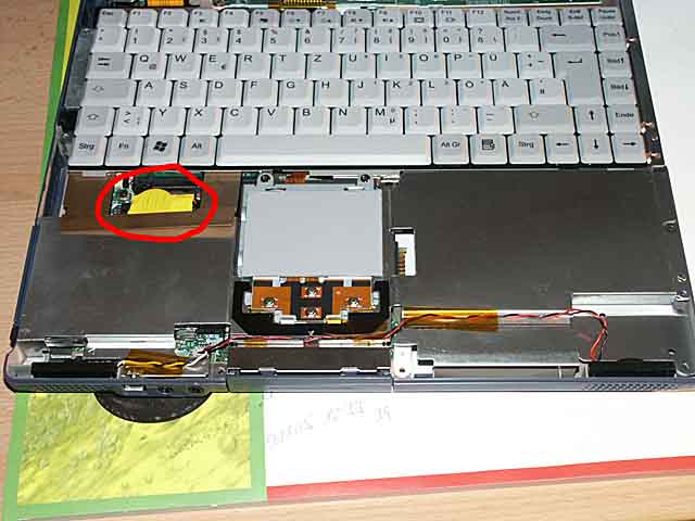 The yellow thing is the BIOS battery.